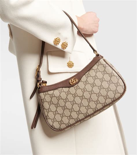 gucci eden small gg supreme tote|Gucci ophidia white shoulder bag.